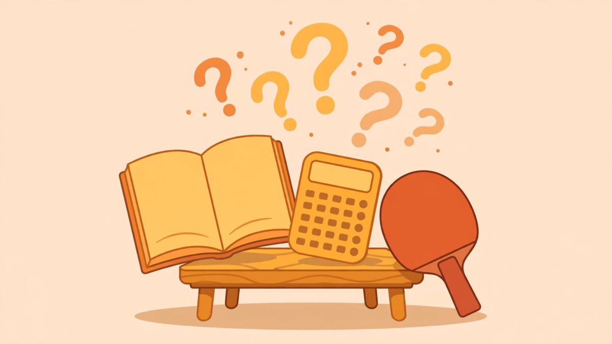 Multiplication book, wooden table and table tennis paddle illustrating confusion over the meaning of tables in a website name